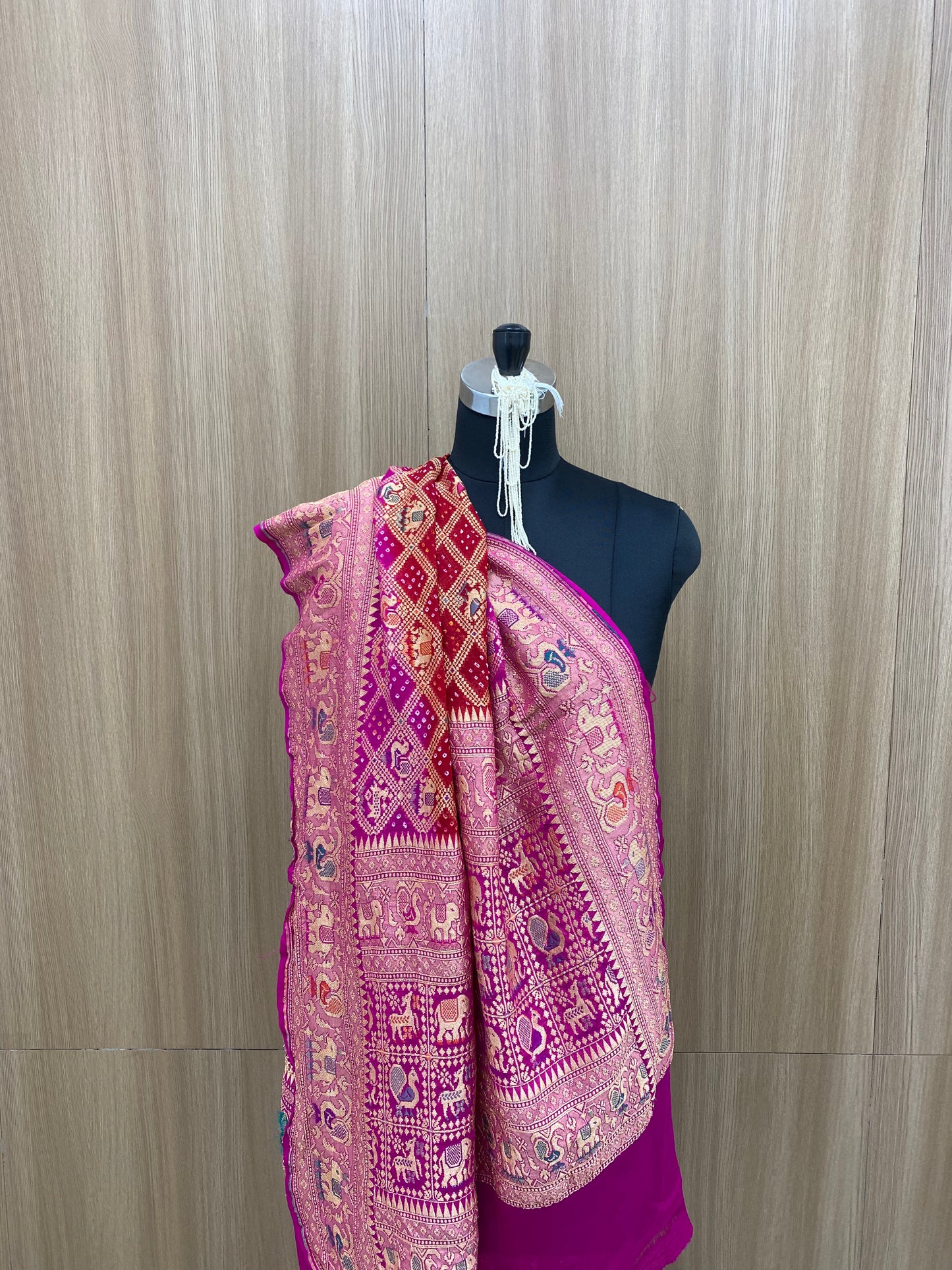 Pretty Unique Animal Figure Traditional Embroidery With Hand Bandhani Print, Meenakai Work And Premium Golden Zari Work On Pink Pure Khadi Georgette Dupatta