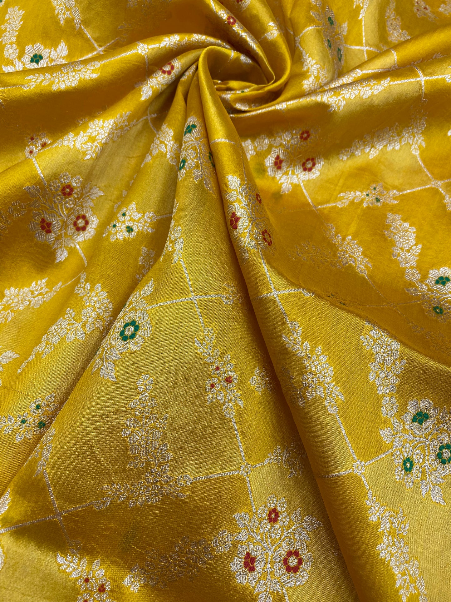 Exclusive Pretty Floral Patterned Golden Zari Weaving On Pure Silk Tissue Fabric