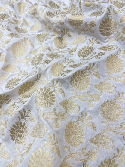 Luxurious Subtle Floral Silk Jacquard Work With Zari Weaving On White Dyeable Banarasi Fabric