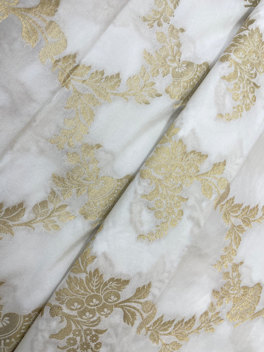 Eye Catching Flower & Leafy Silk Jacquard Work With Zari Weaving On White Dyeable Banarasi Fabric