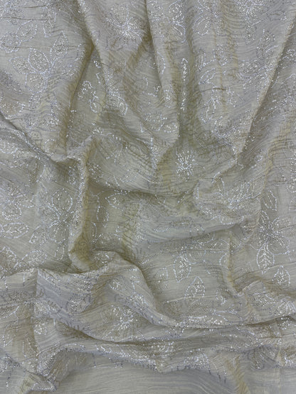 Glorious Stunning Floral Zari Weaving With Dainty Sequin Work On Dyeable Tissue Fabric