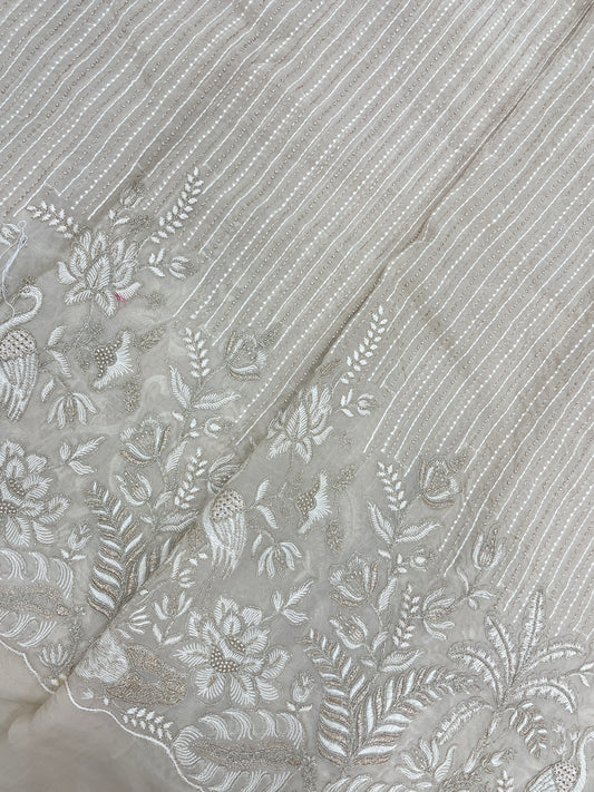 Luxurious Beautiful White Figure And Floral Thread Embroidery With Zari Work On Viscose Organza Fabric