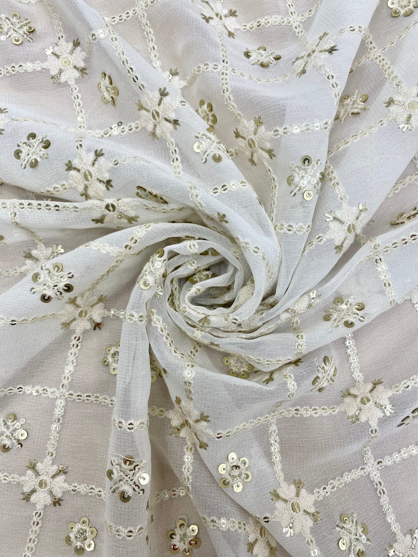 Beautiful Geometric Thread Embroidery With Foil And Golden Sequin Work On White Dyeable Viscose Georgette Fabric