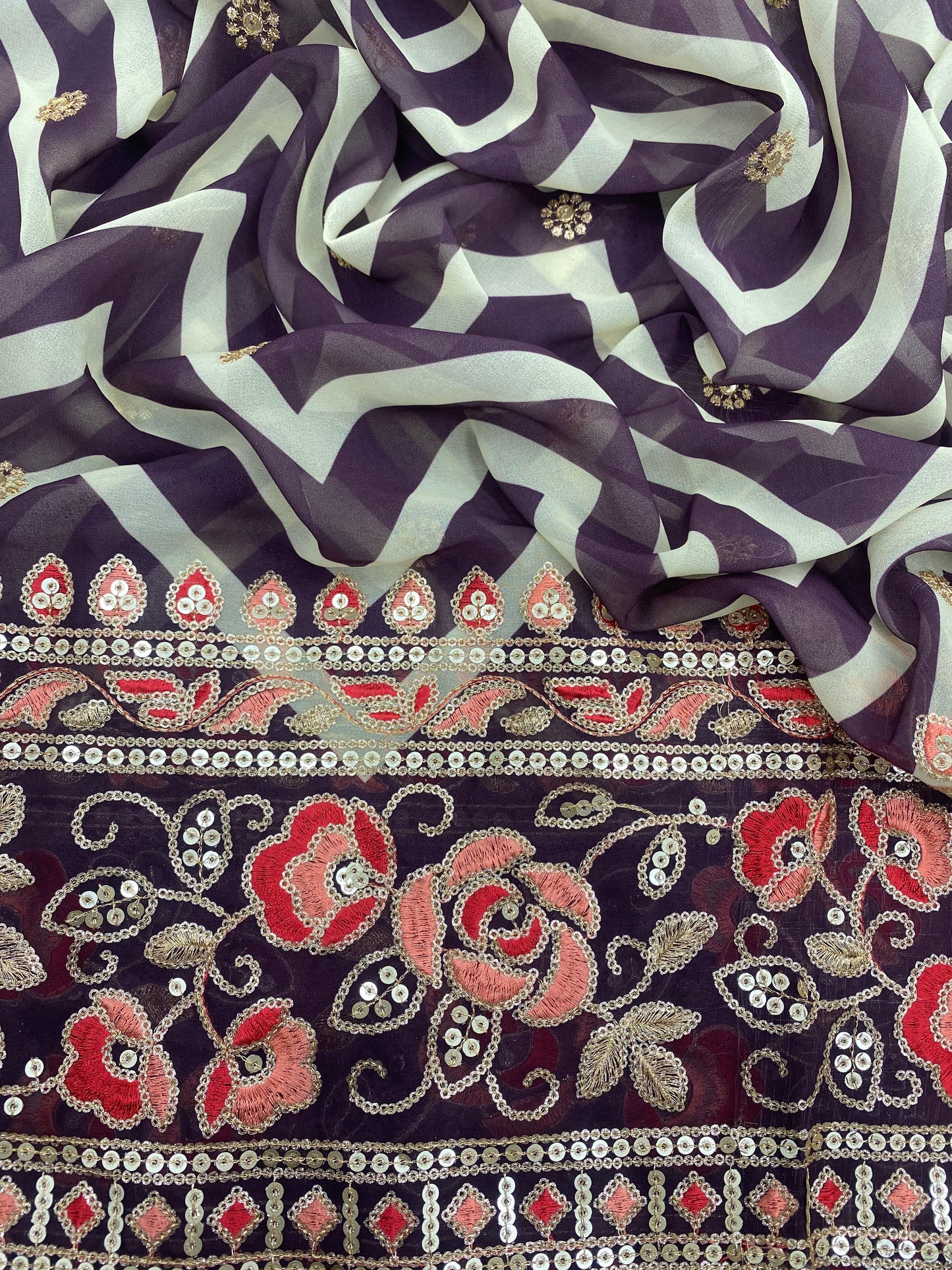 Traditional White And Purple Trellis Pattern Print With Small Zari Butti Work And Heavy Premium Thread Border Embroidery On  Viscose Georgette Fabric