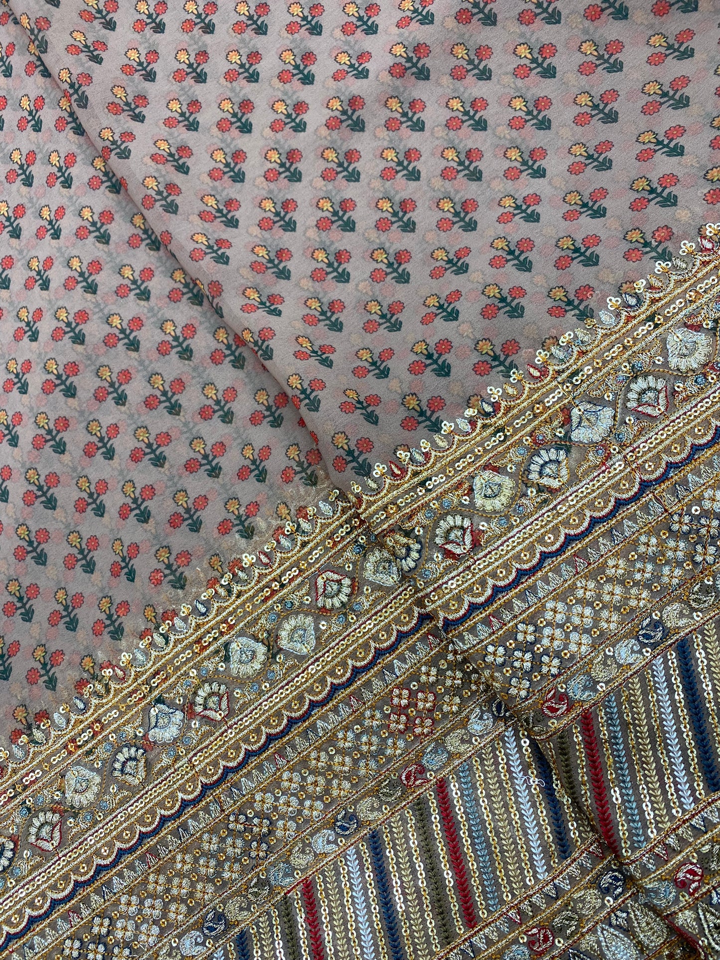 Delicate Print With Heavy Traditional Golden Sequin Zari Embroidery And Thread Work On Brown Viscose Georgette Fabric