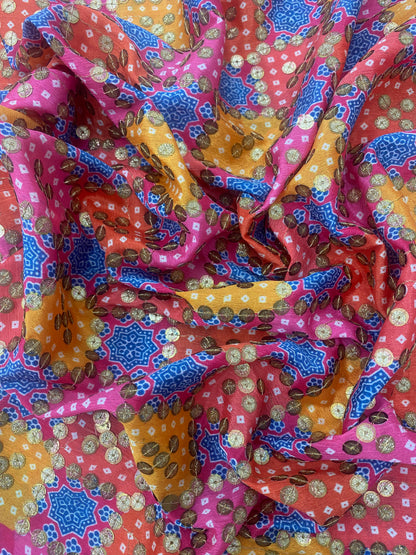 Appealing Yellow And Pink Geometric Bandhani Patches Print With Sparkling Golden Sequins On Chinon Fabric